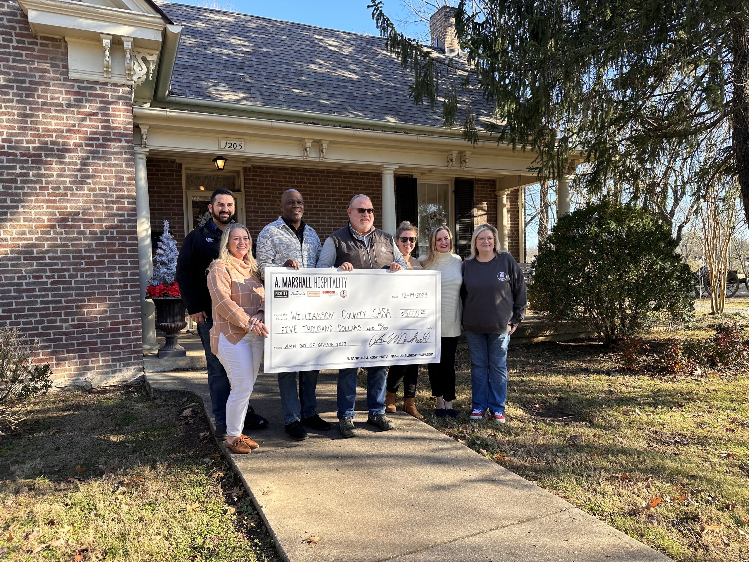 A. Marshall Hospitality presents Williamson County CASA with a donation 2