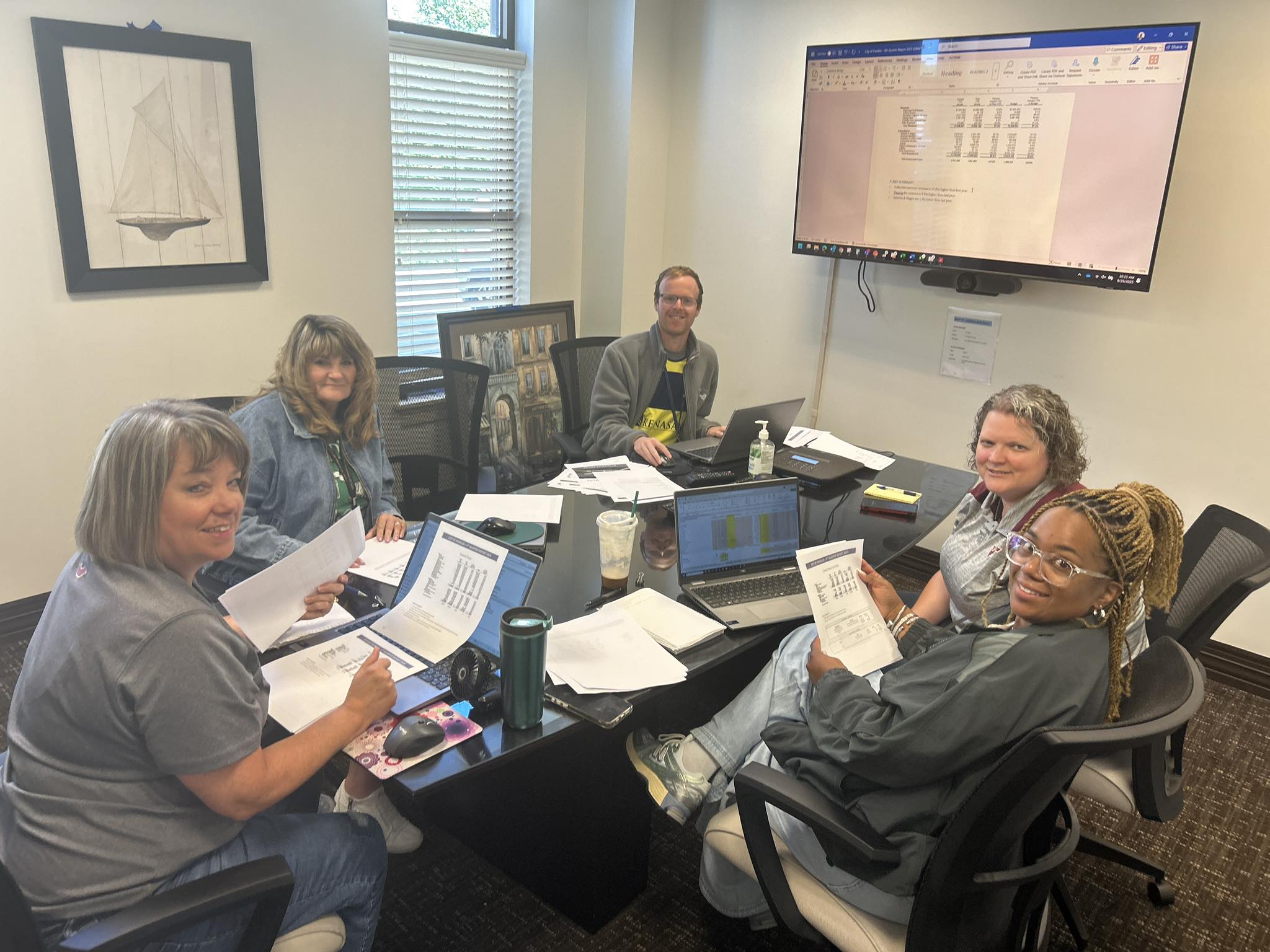 City Finance Team Awarded Certificate for Excellence in Financial Reporting-Pictured in Photo L-R starting at end of table: Lisa Gray, Dawn Wildrick, Caleb Stoner, Margaret Wilson (Finance Director), Angela Sparkman.