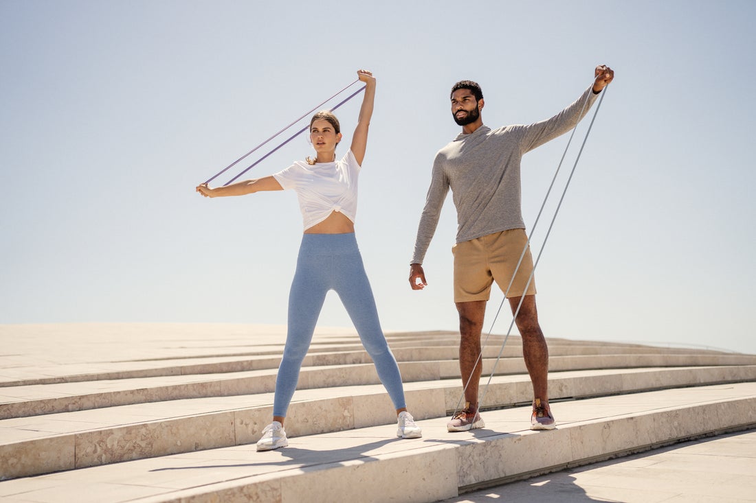 Vuori store in Franklin, TN, woman and a man in Vuori clothing, apparel, shoes and accessories while exercising.
