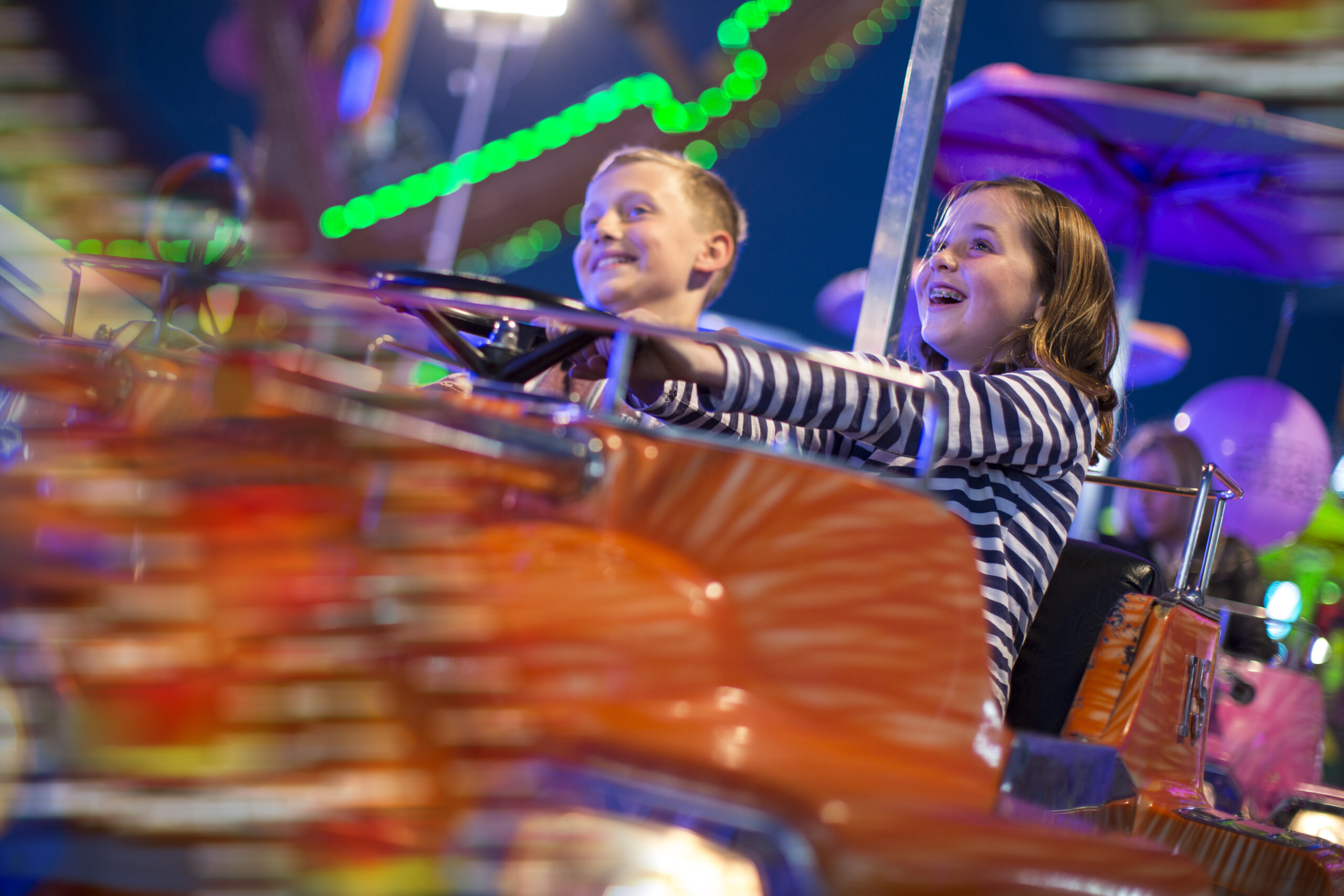 Williamson County Fair in Franklin, TN, kids on a ride at the fair, kids activities at a family friendly event.