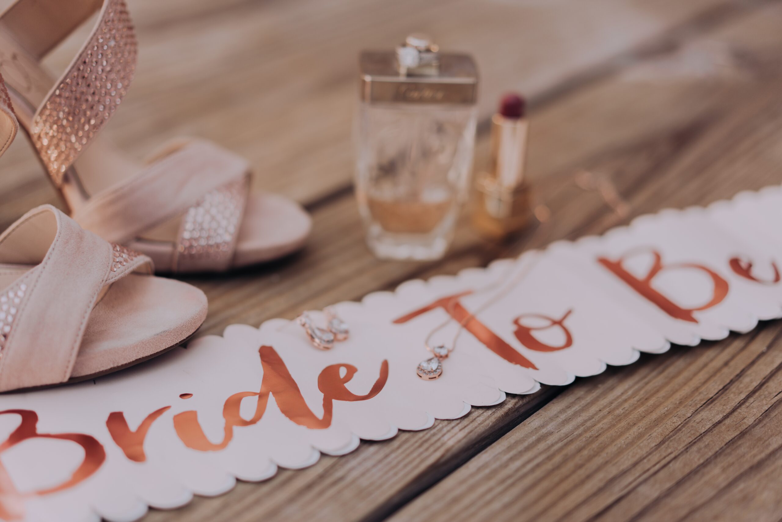 A Bride-to-be Sash, shoes, and accessories ready for bachelorette party.