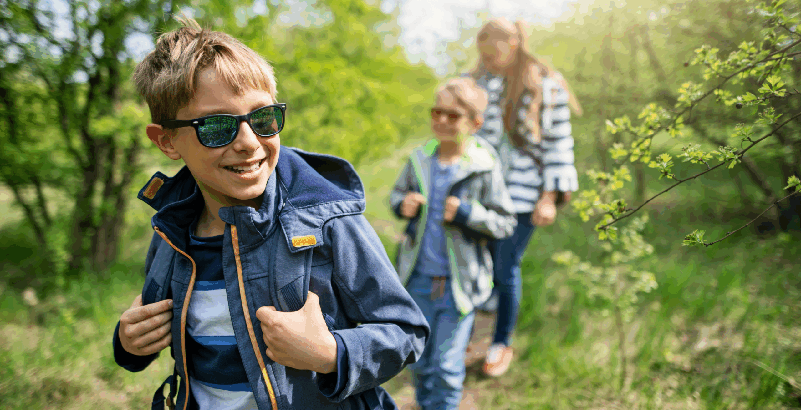 Family hiking in spring